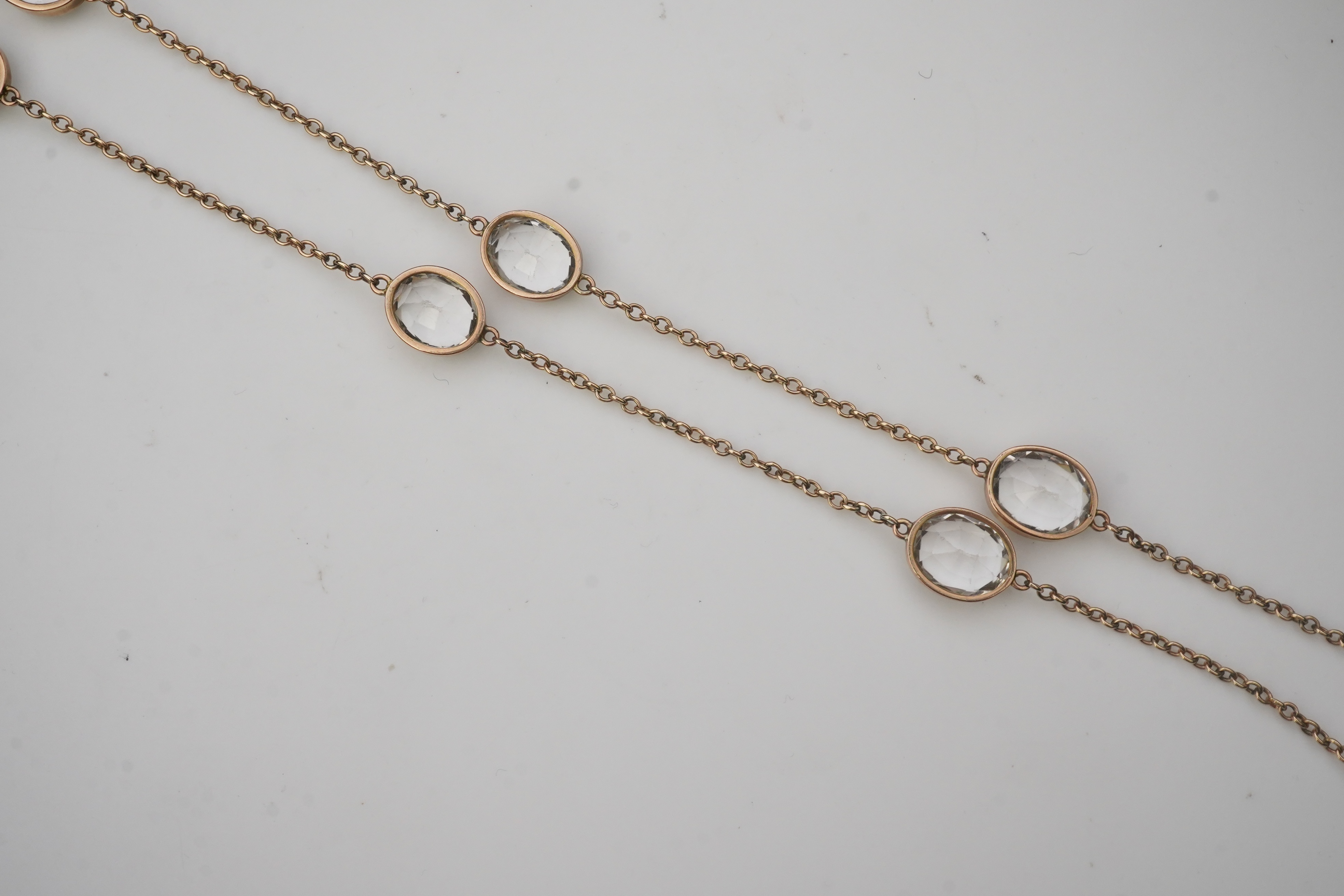 A rock crystal long chain necklace, early 20th century